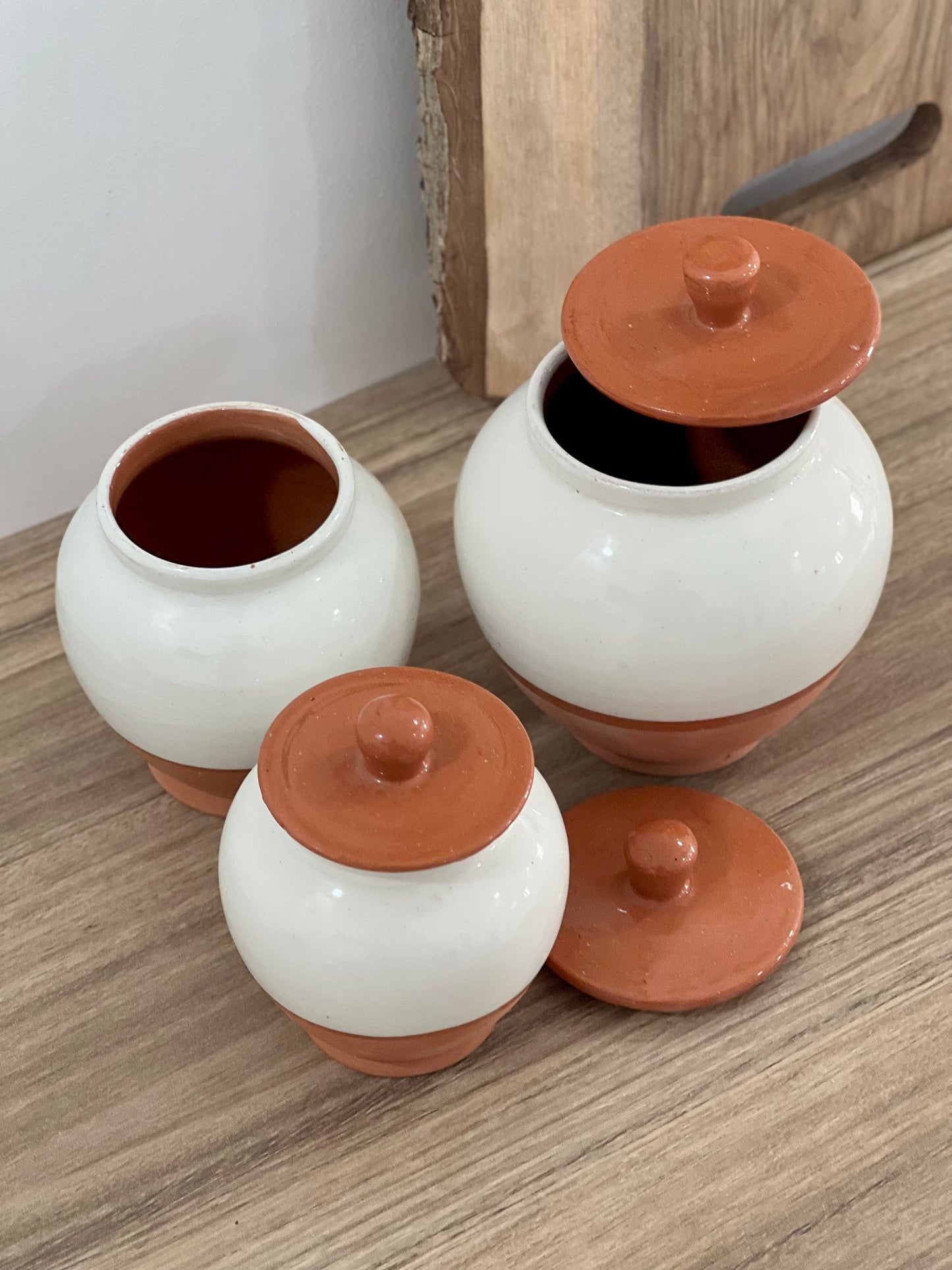 Handcrafted Pottery Kitchen Canisters, Set of 3 Elegant Storage Jars with Unique Half-White and Half-Natural Finish.