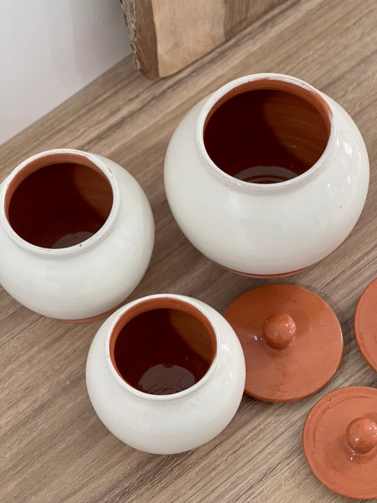 Handcrafted Pottery Kitchen Canisters, Set of 3 Elegant Storage Jars with Unique Half-White and Half-Natural Finish.