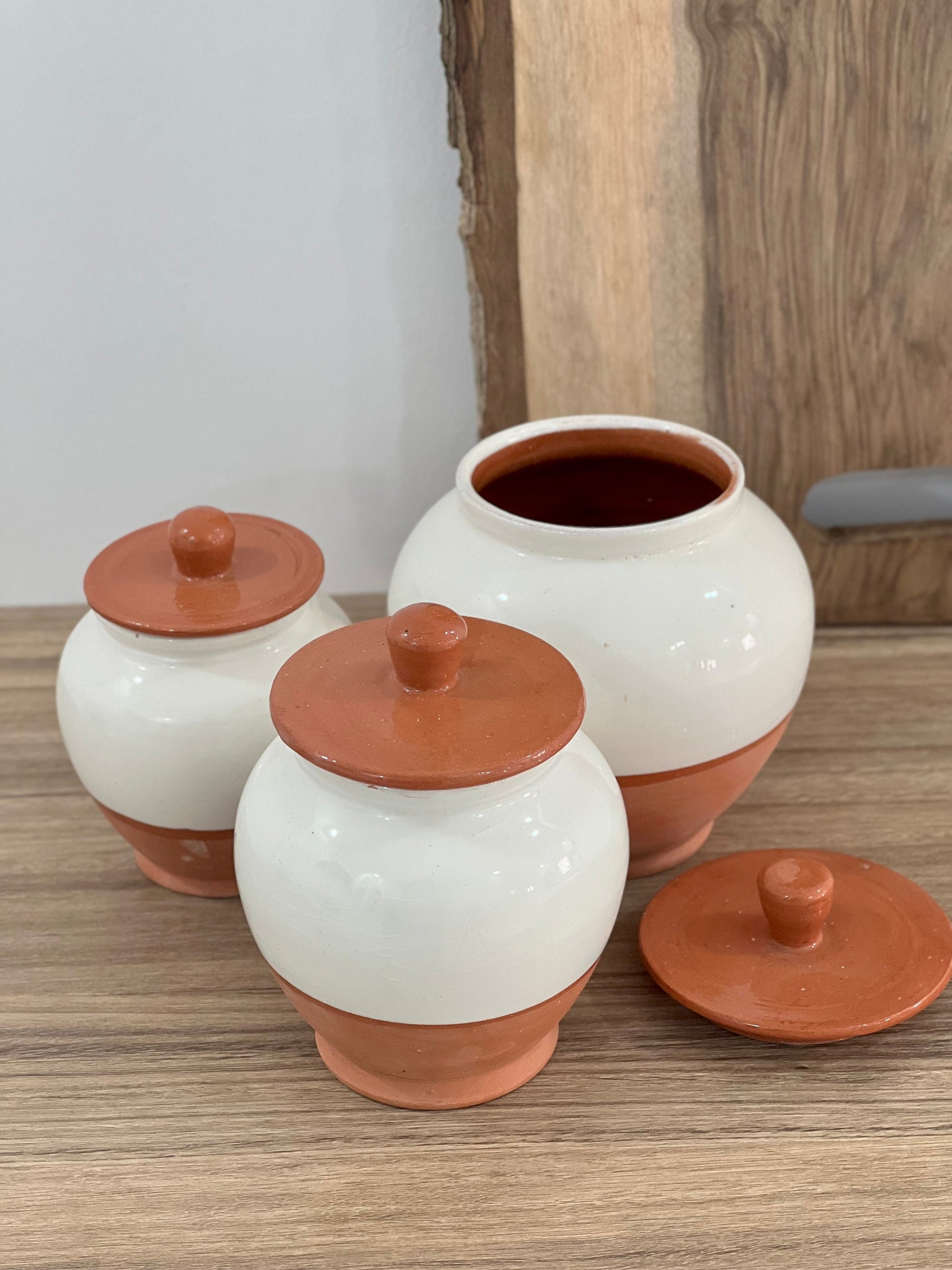 Handcrafted Pottery Kitchen Canisters, Set of 3 Elegant Storage Jars with Unique Half-White and Half-Natural Finish.